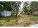 Large backyard featuring a storage shed at 1142 7Th Nw St, Largo, FL 33770