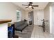 Cozy living space with a comfortable couch, tile flooring, and bright natural light, creating an inviting atmosphere at 1142 7Th Nw St, Largo, FL 33770