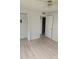 This bedroom offers natural light, new flooring and convenient closet access at 11802 Raintree Lake Ln # B, Temple Terrace, FL 33617