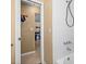 Tiled bathroom featuring a shower over the tub, offering a functional and clean space at 1226 Hermitage Ave, Clearwater, FL 33764