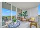 Inviting balcony features water view, seating, and bright interiors at 1325 Snell Isle Ne Blvd # 810, St Petersburg, FL 33704