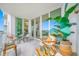 Charming balcony featuring comfortable seating, stylish decor, and serene views of the outside at 1325 Snell Isle Ne Blvd # 810, St Petersburg, FL 33704