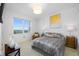 Bright bedroom with a large window offering a serene view of the landscape at 1325 Snell Isle Ne Blvd # 810, St Petersburg, FL 33704