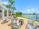 Inviting outdoor fire pit area with comfortable seating, perfect for relaxing and enjoying the waterfront views at 1325 Snell Isle Ne Blvd # 810, St Petersburg, FL 33704