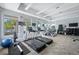 Well-lit gym with treadmills, rowing machines, and various workout stations for a complete fitness routine at 1325 Snell Isle Ne Blvd # 810, St Petersburg, FL 33704