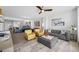 Open living space with kitchen and dining areas under a stylish ceiling fan at 1325 Snell Isle Ne Blvd # 810, St Petersburg, FL 33704