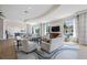 A stylish living room with comfortable seating and a large flat-screen TV for entertainment at 1325 Snell Isle Ne Blvd # 810, St Petersburg, FL 33704