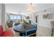 Bright living room boasts waterfront views, stylish furniture, and modern decor at 1325 Snell Isle Ne Blvd # 810, St Petersburg, FL 33704