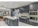 Beautiful kitchen featuring a large island, modern appliances, and an open layout at 1402 E Powhatan Ave, Tampa, FL 33604