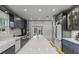 Spacious kitchen featuring a large island, modern appliances, and ample counter space at 1402 E Powhatan Ave, Tampa, FL 33604