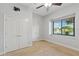 Bedroom featuring a water view from the window and closet with double doors at 15104 Azra Dr, Odessa, FL 33556
