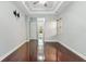 Bedroom featuring hardwood floors and ample natural light, providing a comfortable atmosphere at 15104 Azra Dr, Odessa, FL 33556