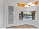 Breakfast nook with window and view of the backyard pool at 15104 Azra Dr, Odessa, FL 33556