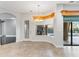 Bright breakfast nook featuring tile flooring, a light fixture, and a view to the pool at 15104 Azra Dr, Odessa, FL 33556