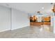 Bright and spacious open-concept living area features tile floors and an eat-in kitchen at 15104 Azra Dr, Odessa, FL 33556
