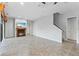Living room boasts tile floors, a fireplace, recessed lighting and sliding glass doors to an outdoor patio at 15104 Azra Dr, Odessa, FL 33556