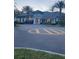 Elegant clubhouse with stone accents and well-maintained landscaping at 1600 Still River Dr, Venice, FL 34293