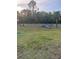 Well-maintained community dog park featuring agility equipment and lush green grass at 1600 Still River Dr, Venice, FL 34293