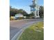 Grand Palm community entrance with a distinctive tower and signage at 1600 Still River Dr, Venice, FL 34293