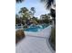 Inground pool with a tiki hut for shade at 1600 Still River Dr, Venice, FL 34293