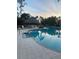 Inground pool with a tiki hut for shade at 1600 Still River Dr, Venice, FL 34293