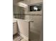 Bathroom featuring a tiled shower with a glass partition and a built-in bench at 1600 Still River Dr, Venice, FL 34293