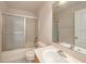 Bathroom with a shower over tub and a white basin sink at 1605 Acorn Seed Ct, Valrico, FL 33594
