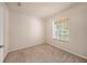 Cozy bedroom filled with light through the large window at 1605 Acorn Seed Ct, Valrico, FL 33594