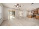 Open-concept living area seamlessly connects to the kitchen, offering a spacious layout at 1605 Acorn Seed Ct, Valrico, FL 33594