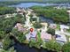 Stunning aerial view of a lakeside community featuring beautiful homes with mature trees and water access at 21215 Preservation Dr, Land O Lakes, FL 34639