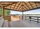 Covered dock featuring seating, views, and lake access at 21215 Preservation Dr, Land O Lakes, FL 34639