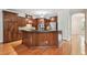 Stylish kitchen featuring granite countertops, custom cabinetry, and stainless steel appliances at 21215 W Preservation N Dr, Land O Lakes, FL 34639
