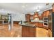 Spacious kitchen with stainless steel appliances, granite counters, and island at 21215 Preservation Dr, Land O Lakes, FL 34639
