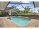 A backyard pool in screened enclosure with patio at 21215 W Preservation N Dr, Land O Lakes, FL 34639
