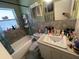 Bathroom featuring a shower-tub combo and vanity sink at 2221 York S St, Gulfport, FL 33707
