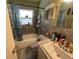 Bathroom featuring a shower-tub combo and vanity sink at 2221 York S St, Gulfport, FL 33707