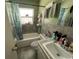 Bathroom featuring bath tub, toilet, and sink at 2221 York S St, Gulfport, FL 33707