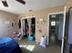 Bedroom featuring a closet and connected bathroom at 2221 York S St, Gulfport, FL 33707