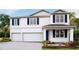 Charming two-story home featuring a two-car garage, well-maintained landscaping and inviting entryway at 2245 Sienna Spruce St, Wesley Chapel, FL 33543