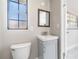 Updated bathroom with a new vanity, mirror, and fixtures at 2285 Victory Ave, Largo, FL 33770