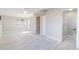 Spacious bedroom with light walls, light flooring and an adjoining bathroom at 2285 Victory Ave, Largo, FL 33770