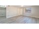 Cozy bedroom featuring a closet, modern floors, and a bright window at 2285 Victory Ave, Largo, FL 33770