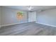 Neutral bedroom featuring bright natural light, ceiling fan, and modern flooring at 2285 Victory Ave, Largo, FL 33770