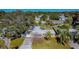 Charming home boasts mature trees and well-manicured front yard at 2285 Victory Ave, Largo, FL 33770