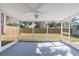 Screened-in porch provides an outdoor retreat with a view of the fenced backyard at 2285 Victory Ave, Largo, FL 33770