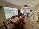 Bright dining area with natural light, adjacent to a multi-purpose office space at 2434 Australia E Way # 50, Clearwater, FL 33763