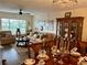 View of a dining room and living room combination featuring hardwood floors and modern furniture at 2434 Australia E Way # 50, Clearwater, FL 33763