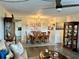 Cozy living room featuring hardwood floors, a dining area combination and modern furniture at 2434 Australia E Way # 50, Clearwater, FL 33763