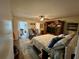 Comfortable main bedroom featuring a king-size bed, private lanai access, and ample space at 2434 Australia E Way # 50, Clearwater, FL 33763