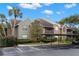 Charming multi-Gathering condo with tropical landscaping, screened in porches and covered parking at 2500 Winding Creek Blvd # A104, Clearwater, FL 33761